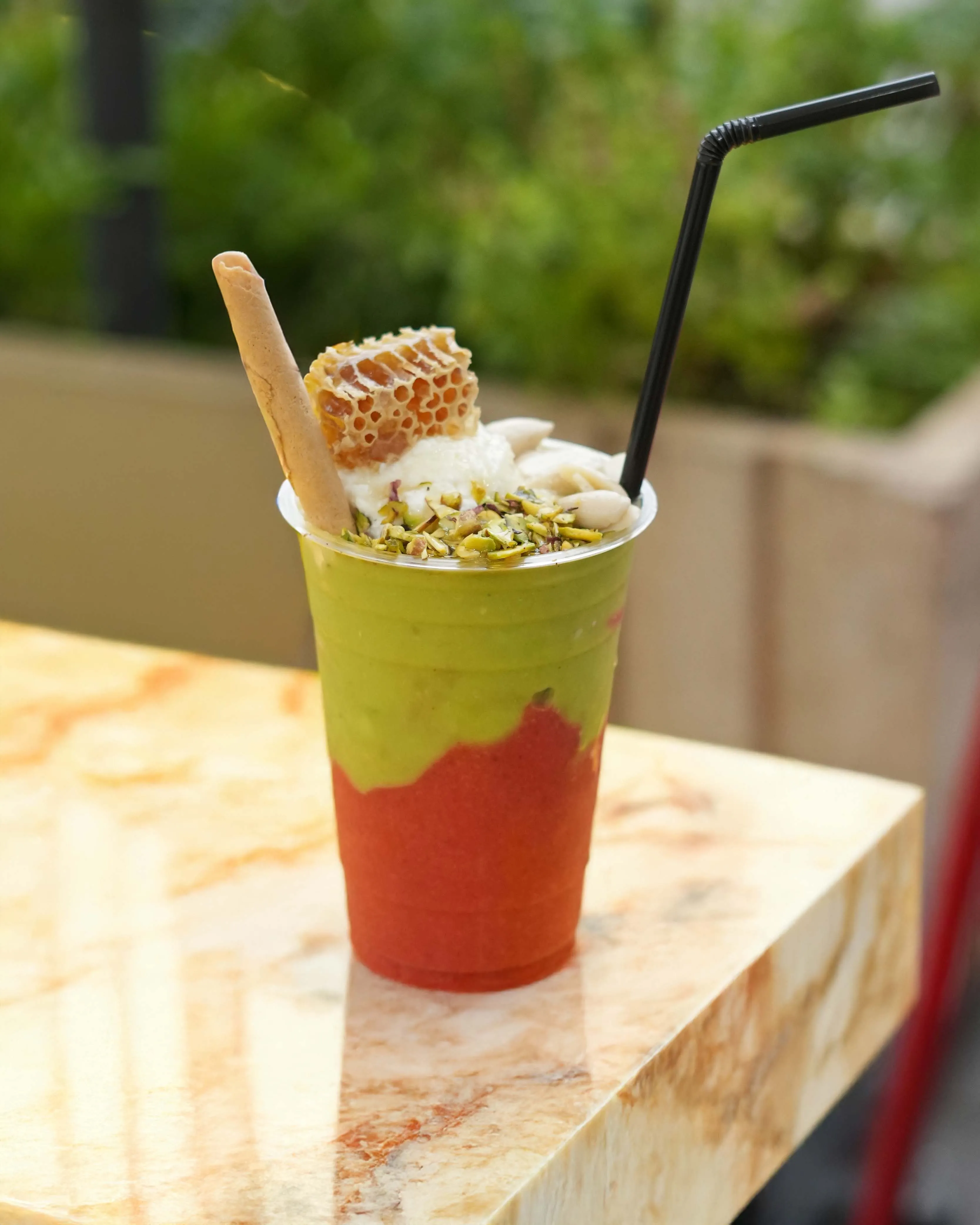 Image of Turbo – Blended avocado, Cocktail Juice, almonds, honey & honey Combe, your choice of Ashta or fresh cream on top