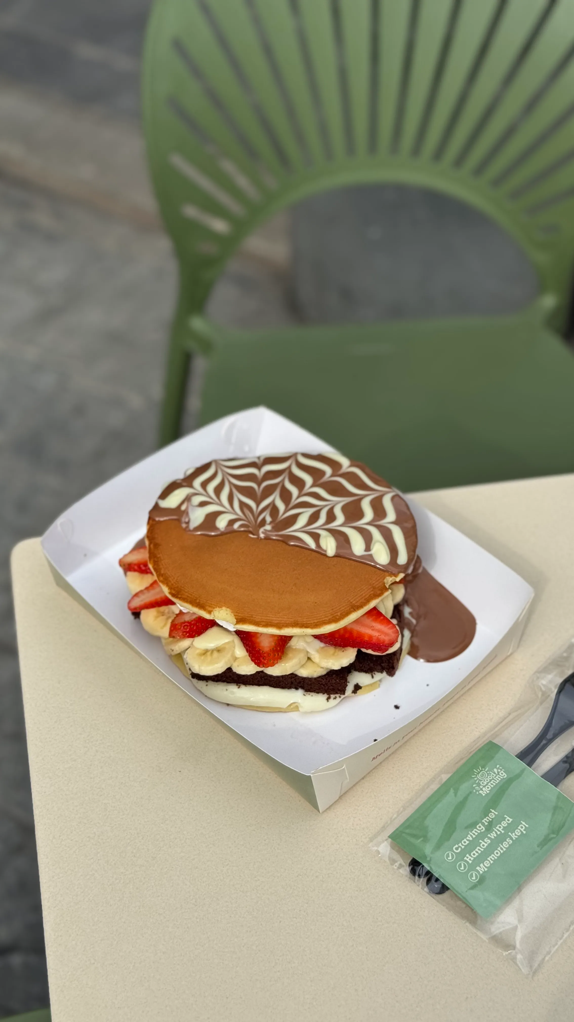 Image of Chocolate Burger – 2 pancake layers, pastry cream, brownies, strawberry & banana slices all in between. Topped with Belgium chocolate.