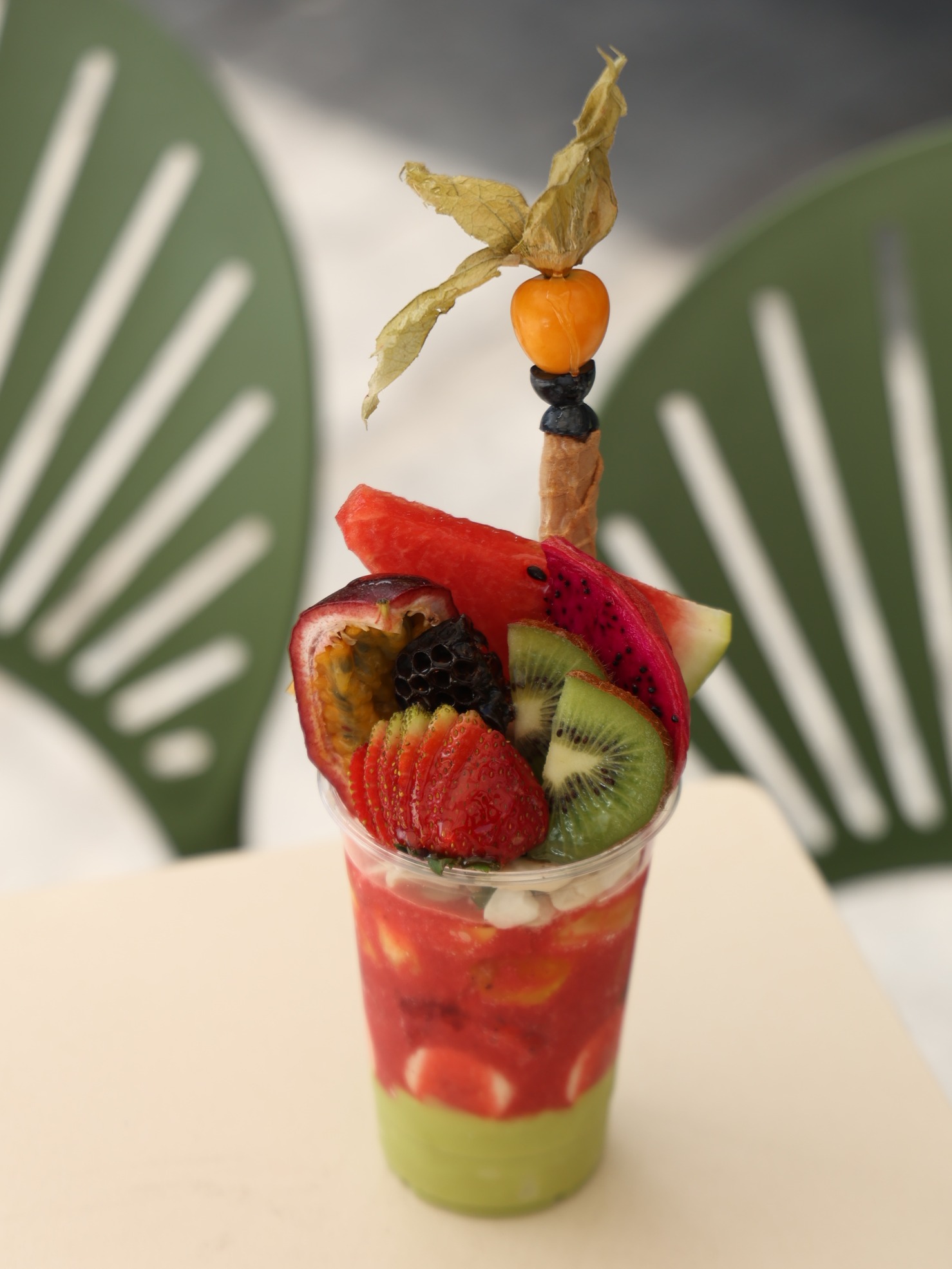 Image of Cocktail Pieces – Sliced fruits, cocktail juice, blended pure avocado, topped with fruits, almonds, and your choice of Ashta or fresh cream