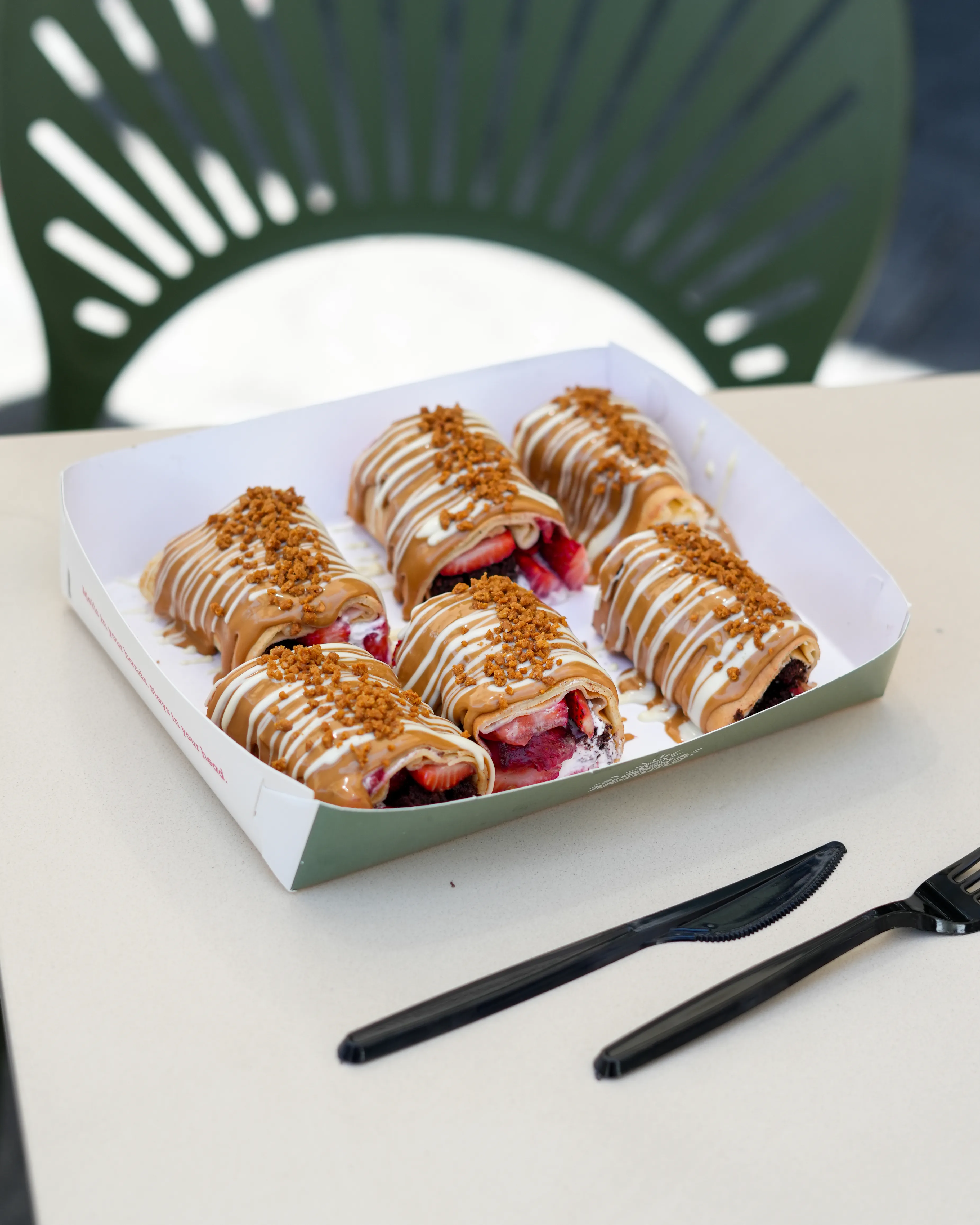 Image of Lotus Roll Crepe – Crepe dough, cream cheese, brownies, straberry, lotus spread